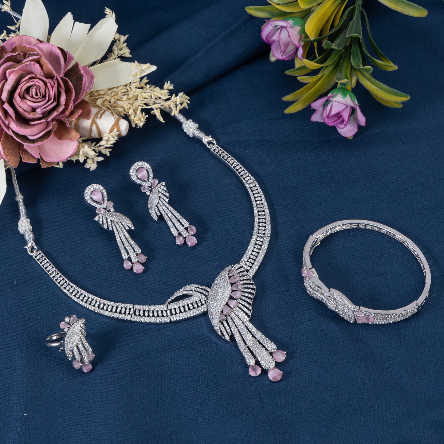 WHITE AND PINK ZIRCON-STUDDED NECKLACE SET WITH MATCHING EARRINGS AND BRACELET, EXUDING ELEGANCE AND CHARM