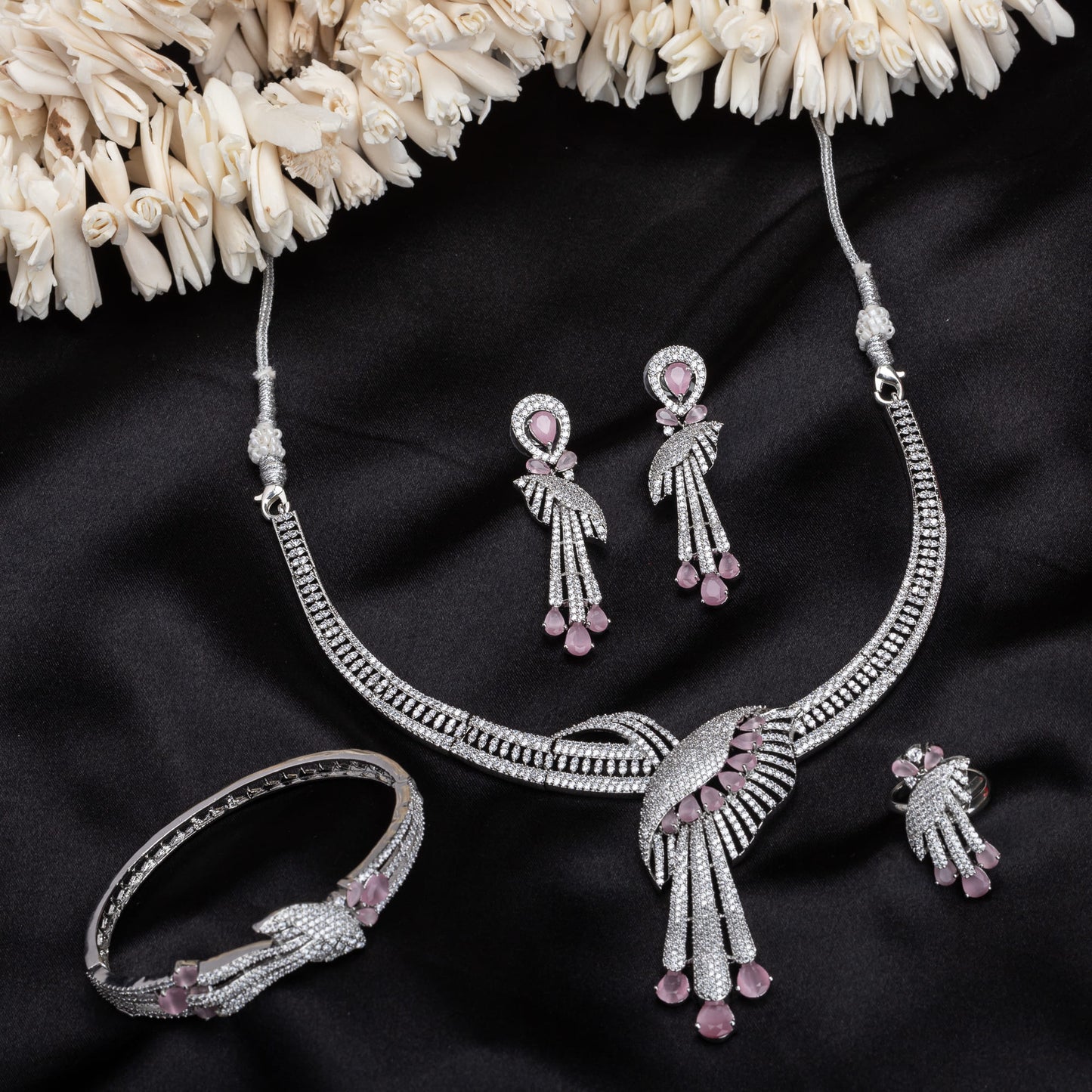 WHITE AND PINK ZIRCON-STUDDED NECKLACE SET WITH MATCHING EARRINGS AND BRACELET, EXUDING ELEGANCE AND CHARM