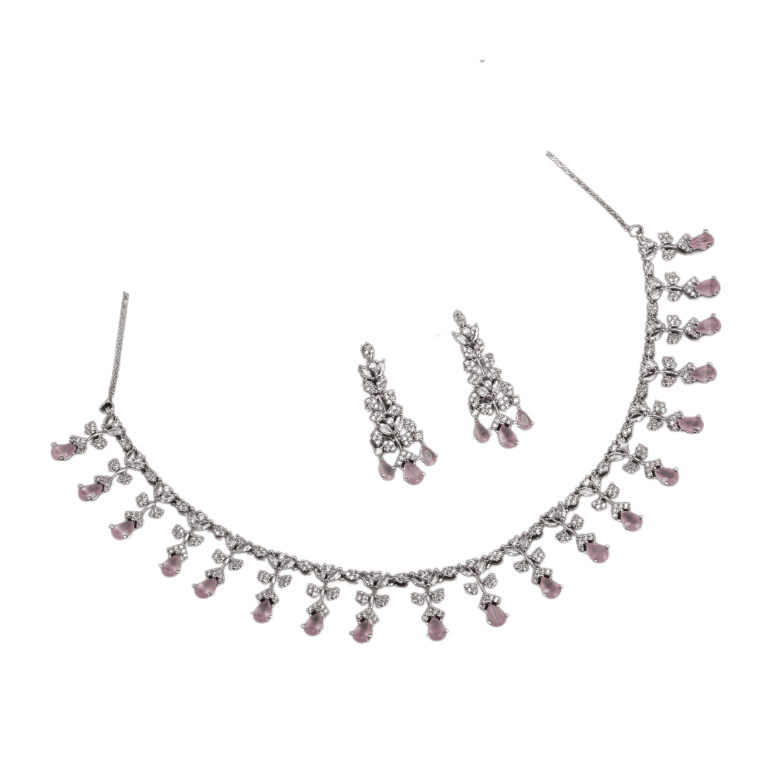 THIS NECKLACE SET FEATURES PINK AND WHITE ZIRCON STONES INTRICATELY SET TO CREATE A DELICATE AND ELEGANT DESIGN. PAIRED WITH MATCHING EARRINGS.