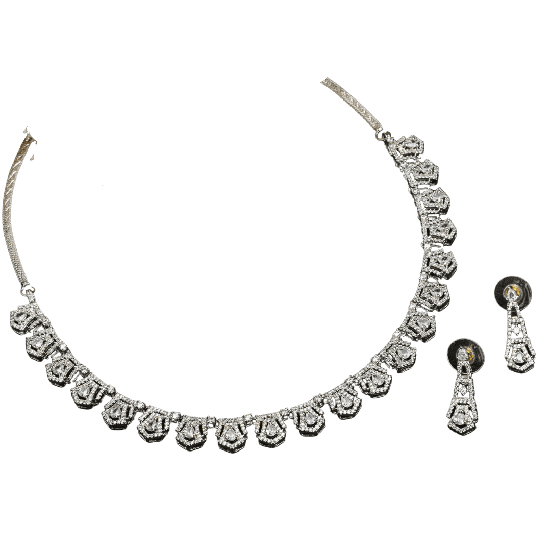 THIS WHITE ZIRCON STONE-STUDDED SHORT NECKLACE SET EXUDES TIMELESS ELEGANCE AND SOPHISTICATION. INCLUDES MATCHING EARRINGS,