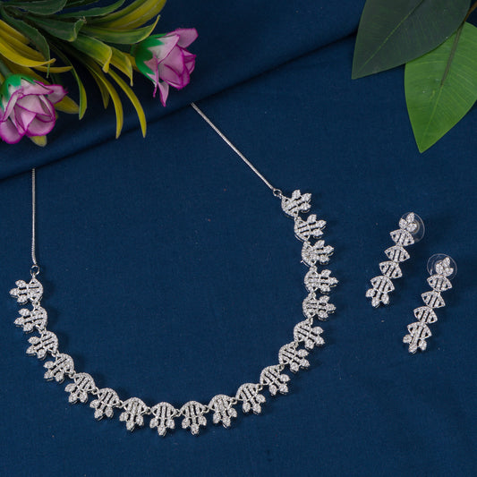 THIS WHITE ZIRCON STONE-STUDDED SHORT NECKLACE SET EXUDES TIMELESS ELEGANCE AND SOPHISTICATION. INCLUDES MATCHING EARRINGS,