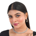 White zircon short necklace set with matching earrings, exuding timeless elegance.
