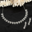 White zircon short necklace set with matching earrings, exuding timeless elegance.
