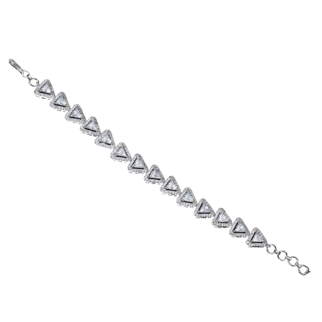 THIS SILVER-POLISHED CHAIN BRACELET, STUDDED WITH SHIMMERING ZIRCON STONES, IS PERFECT FOR PARTY WEAR.