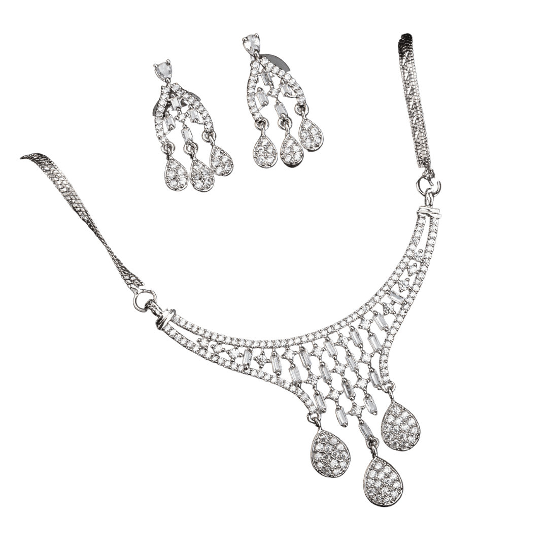 THIS WHITE ZIRCON-STUDDED PENDANT AND EARRINGS SET. PERFECT FOR ADDING ELEGANCE TO ANY ENSEMBLE.