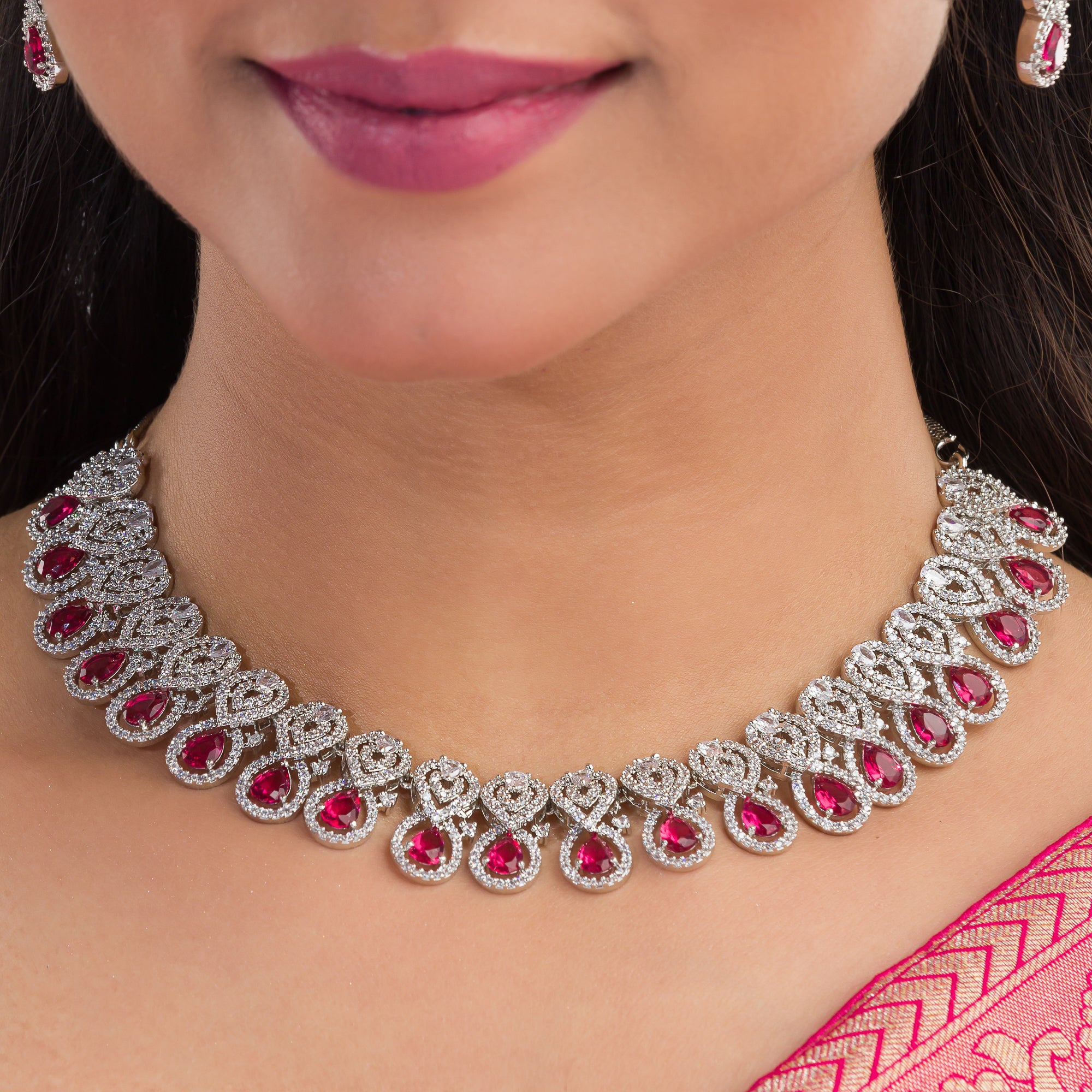 Bold red zircon necklace set, combining vibrant red stones with dazzling zircon sparkle for elegance.
