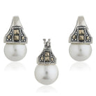 Pearl-studded 925 silver pendant set with matching earrings, adding elegance to your casual style.
