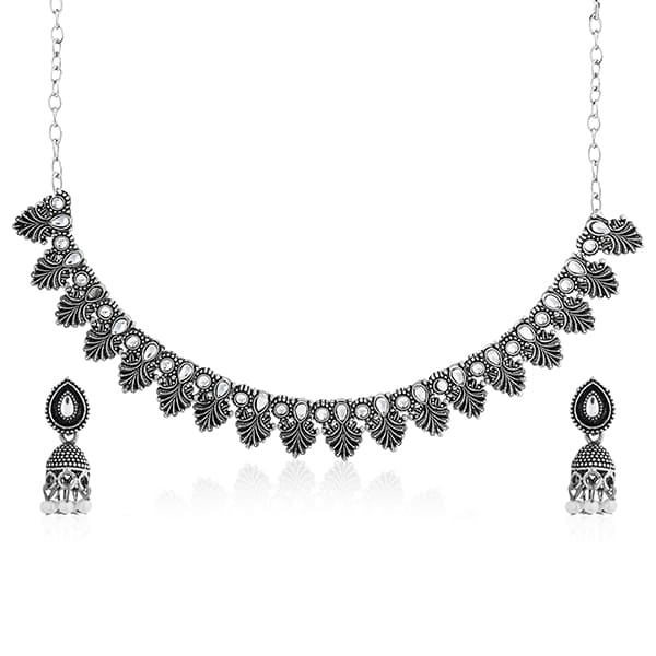 THIS OXIDIZED NECKLACE SET OFFERS A BLEND OF TRADITIONAL CHARM AND CONTEMPORARY STYLE, PERFECT FOR ADDING A BOLD STATEMENT TO YOUR LOOK.