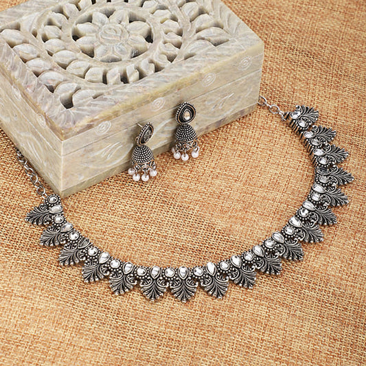 THIS OXIDIZED NECKLACE SET OFFERS A BLEND OF TRADITIONAL CHARM AND CONTEMPORARY STYLE, PERFECT FOR ADDING A BOLD STATEMENT TO YOUR LOOK.