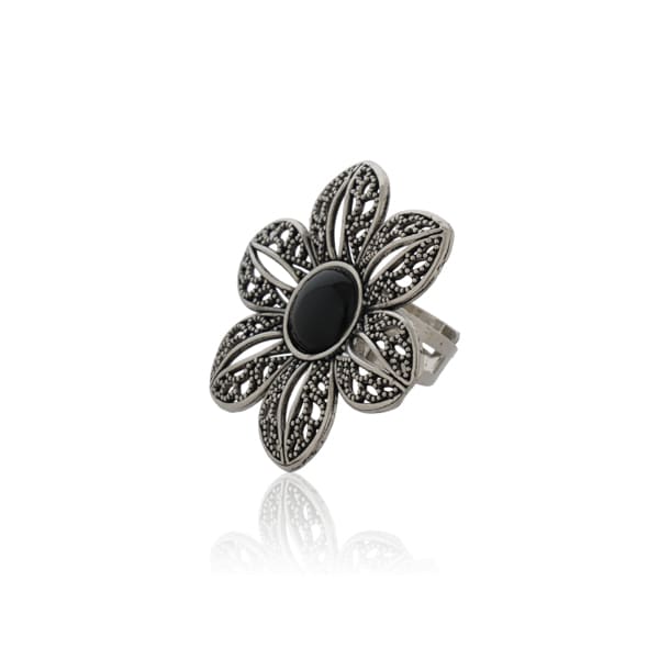 EMBRACE VINTAGE CHARM WITH THIS FLORAL DESIGN OXIDIZED FINGER RING. ITS INTRICATE FLORAL PATTERNS AND ANTIQUE FINISH .