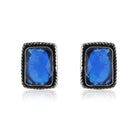 Vintage oxidized earrings with blue stones, adding vibrant color and charm.
