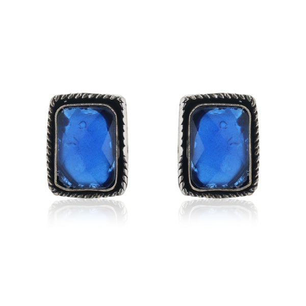 Vintage oxidized earrings with blue stones, adding vibrant color and charm.
