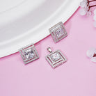 925 silver pendant set with zircon-studded earrings, adding sophisticated sparkle.
