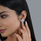 925 silver pendant set with zircon-studded earrings, adding sophisticated sparkle.
