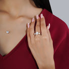 "925 silver pendant set with zircon stones, includes matching earrings and finger ring for a complete look."
