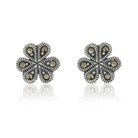 "925 silver pendant and earrings set with floral design, exuding elegance and sophistication."
