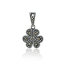 "925 silver pendant and earrings set with floral design, exuding elegance and sophistication."
