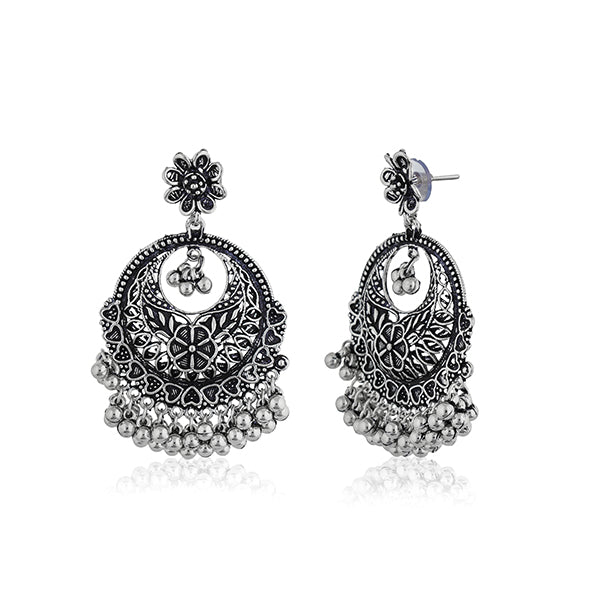 "Exquisitely crafted oxidized danglers with vintage charm, perfect for festive elegance."
