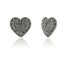 "925 silver heart-shaped studs, blending timeless elegance with everyday style."
