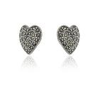 "925 silver heart-shaped studs, blending timeless elegance with everyday style."
