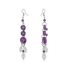 "Purple button-studded oxidized danglers, adding a chic and stylish touch to festive outfits."
