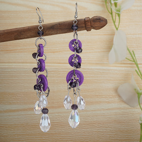 BUTTON-STUDDED DANGLER EARRINGS, OFFERING A CHIC AND STYLISH LOOK.