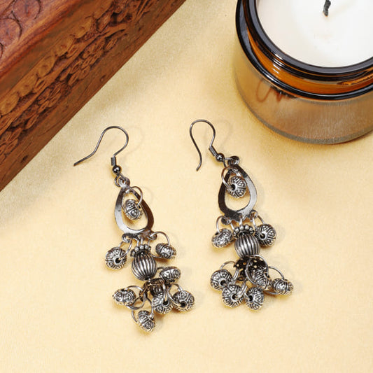 BLACK-COLORED DANGLER EARRINGS, FEATURING A SLEEK AND MODERN DESIGN.