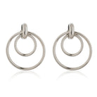 "Elegant oxidized silver hoop earrings with a unique ring design, blending modern and classic charm."
