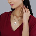 "925 silver pendant with intricate Khalsha design, showcasing cultural significance."
