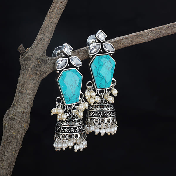 ELEGANT OXIDIZED JHUMKAS WITH INTRICATE DETAILING, OFFERING A TIMELESS BLEND OF TRADITIONAL AND CONTEMPORARY STYLE.