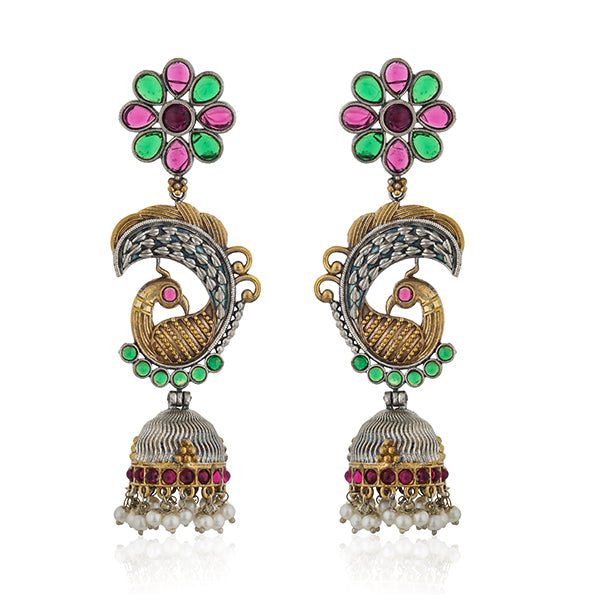 "Long oxidized jhumkas with peacock design, combining traditional elegance and intricate detailing."
