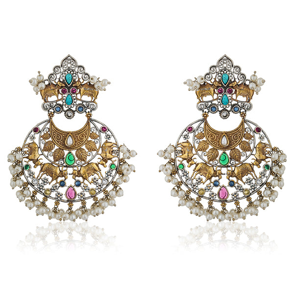 "Beautiful oxidized chandbali earrings with intricate designs and small pearls, offering a classic touch."
