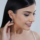 "Elegant 925 silver hoop earrings with a polished finish, perfect for any occasion."
