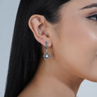 "Elegant 925 silver hoop earrings with a polished finish, perfect for any occasion."
