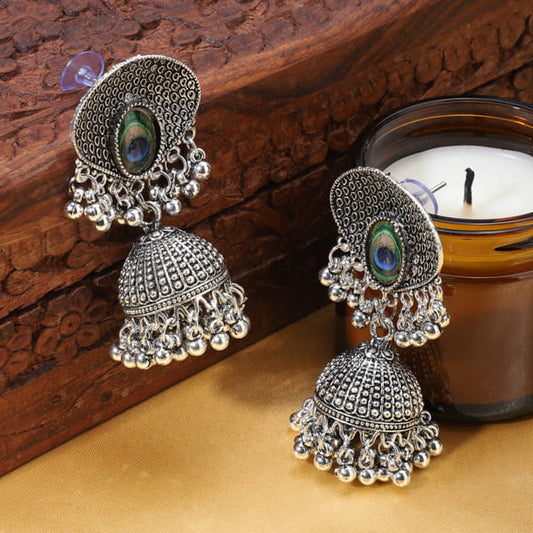 EXQUISITE OXIDIZED JHUMKA EARRINGS FEATURING A BEAUTIFULLY CRAFTED PEACOCK FEATHER DESIGN.