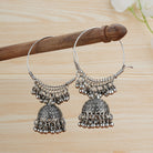 Beautiful oxidized jhumka earrings with intricate detailing, showcasing traditional elegance."
