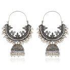 Beautiful oxidized jhumka earrings with intricate detailing for a traditional festive look.
