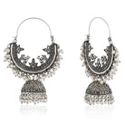 Beautiful oxidized jhumka earrings with intricate detailing for a traditional festive look.
