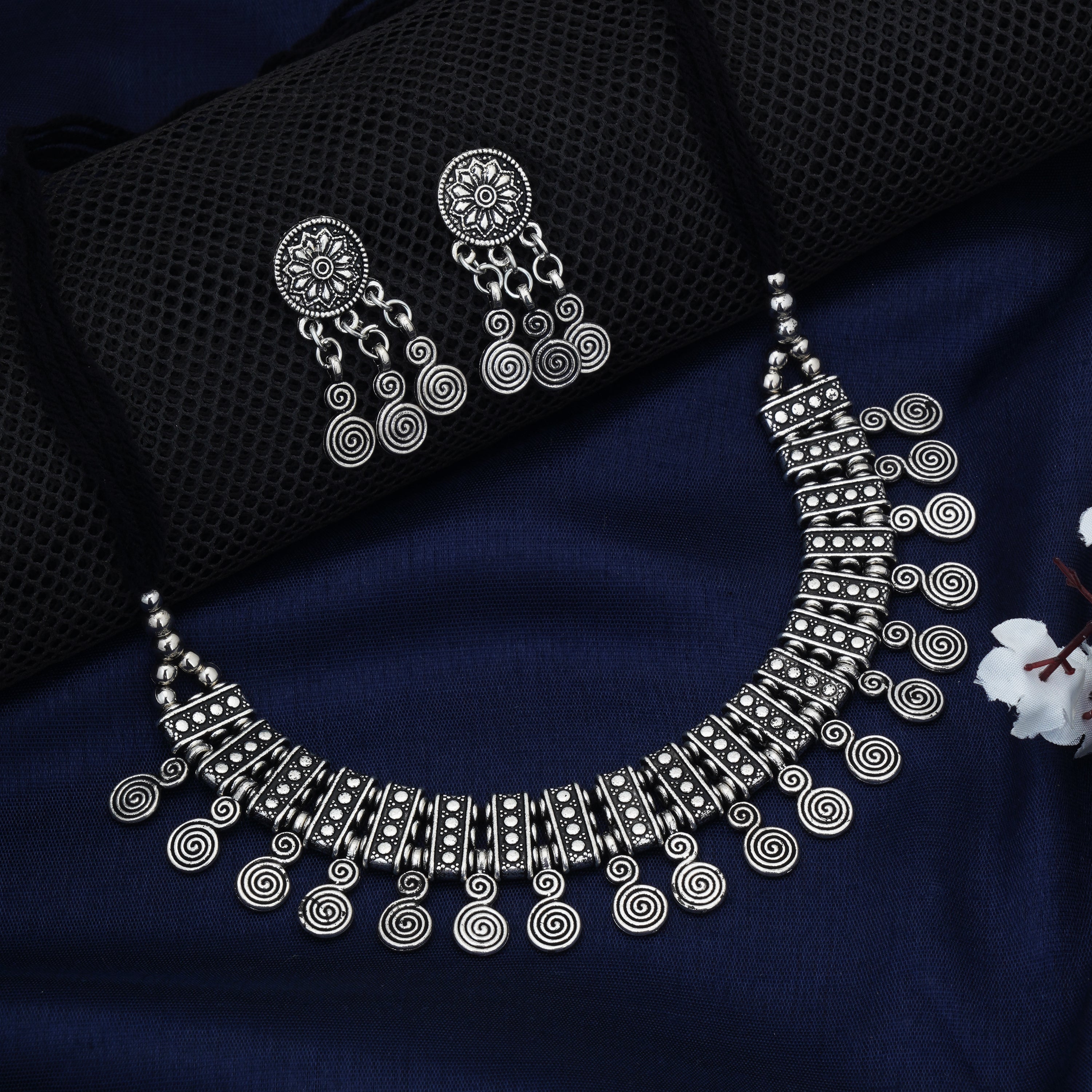 Vintage-style oxidized short necklace set with intricate detailing, perfect for festive elegance.
