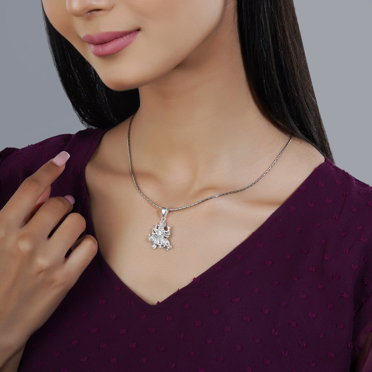 INTRICATELY CRAFTED 925 SILVER PENDANT FEATURING A DETAILED GODDESS DURGA DESIGN. THIS ELEGANT PIECE SYMBOLIZES STRENGTH AND DEVOTION