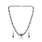 Elegant oxidized short necklace set with fine detailing, adding a timeless vintage touch to festive outfits.
