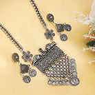 Long oxidized necklace set with intricate designs, blending traditional artistry with vintage charm.
