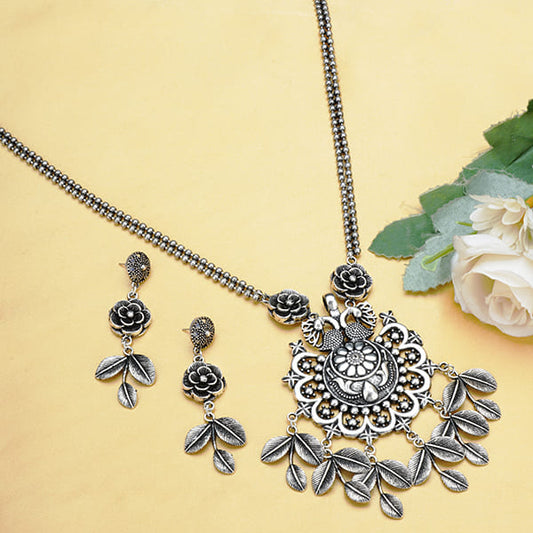 BEAUTIFULLY CRAFTED OXIDIZED LONG NECKLACE SET WITH INTRICATE DESIGN, ADDING TIMELESS ELEGANCE TO ANY LOOK.