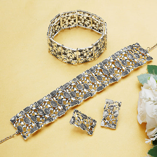 STYLISH OXIDIZED CHOKER SET, COMPLEMENTED BY MATCHING EARRINGS AND A BRACELET.