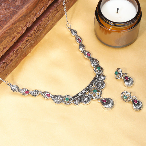 Elegant oxidized choker set with matching earrings and bracelet, ideal for a stylish festive look.
