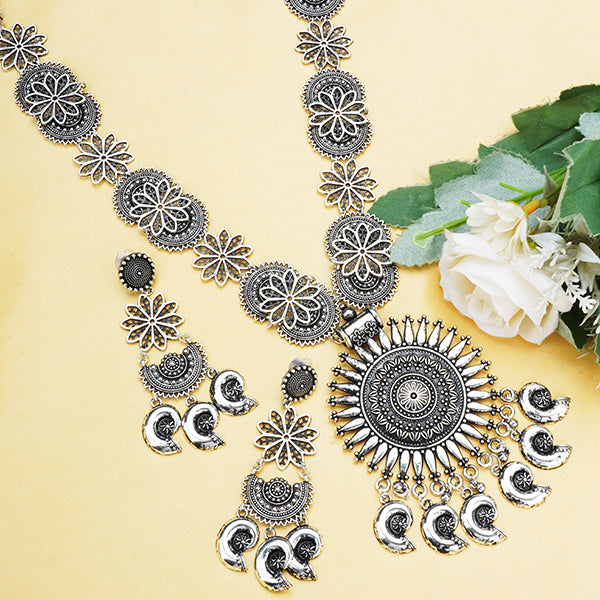 Elegant oxidized long necklace set with intricate floral design, adding classic charm to any outfit.
