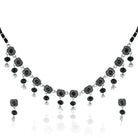 Elegant oxidized short necklace set with black stones, offering a bold and sophisticated look.
