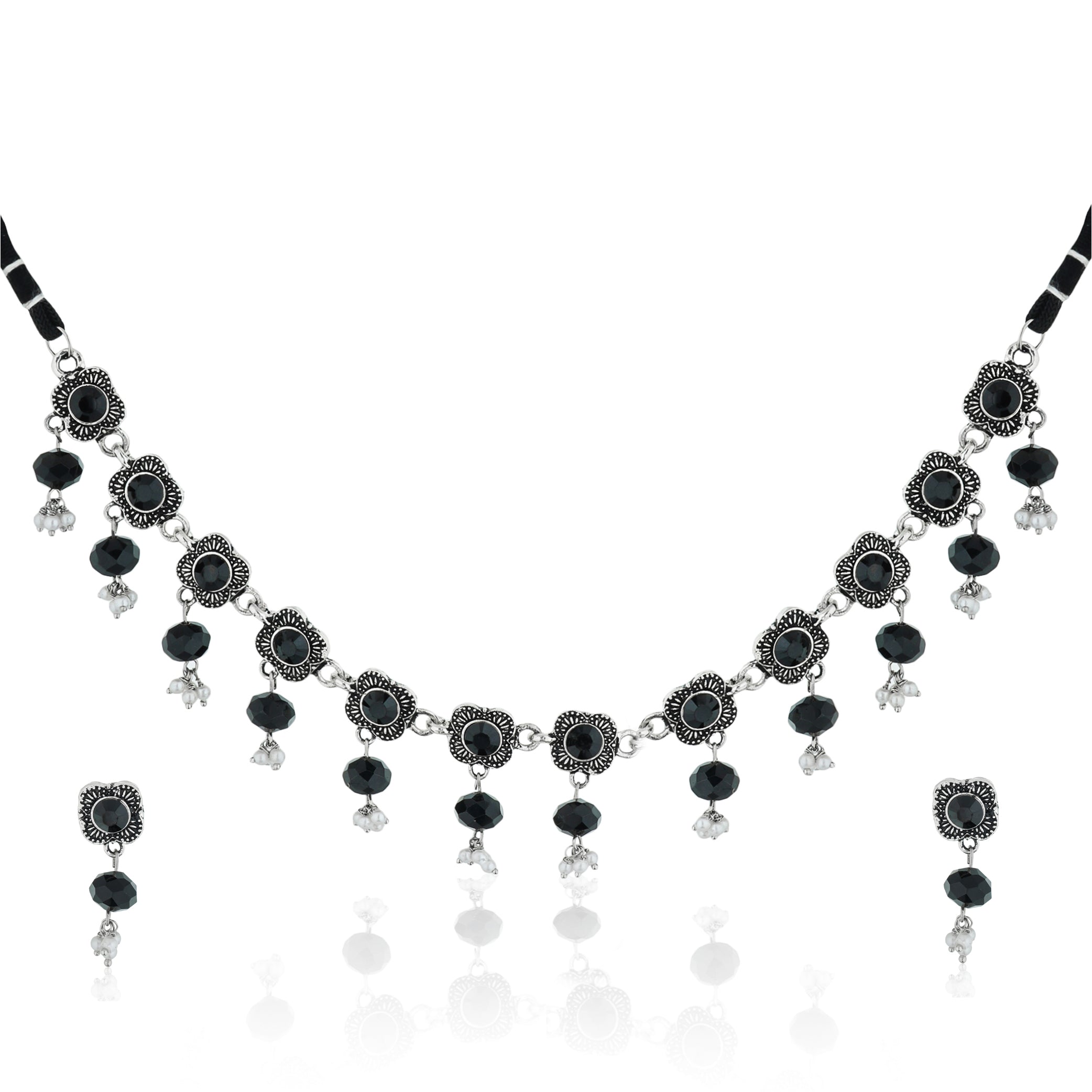 Elegant oxidized short necklace set with black stones, offering a bold and sophisticated look.
