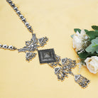 Elegant oxidized long necklace set with intricate detailing, adding vintage charm to any look.
