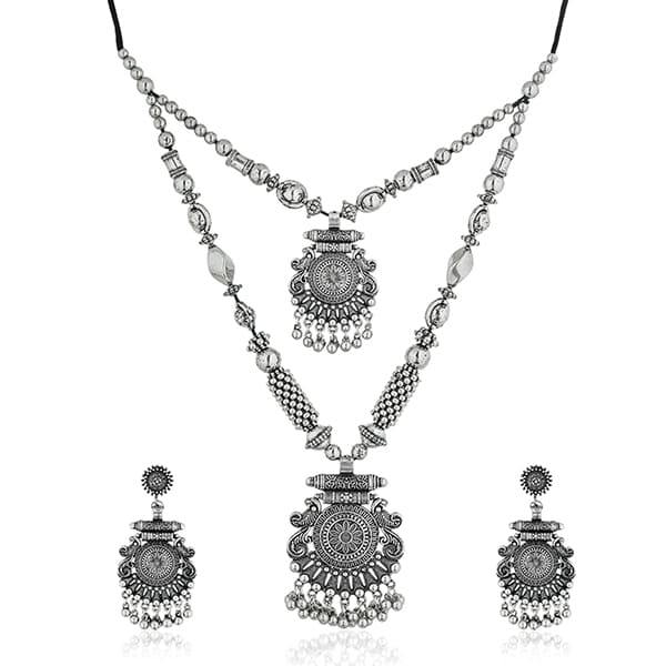 STYLISH OXIDIZED LONG NECKLACE SET WITH INTRICATE DETAILING AND A VINTAGE CHARM.